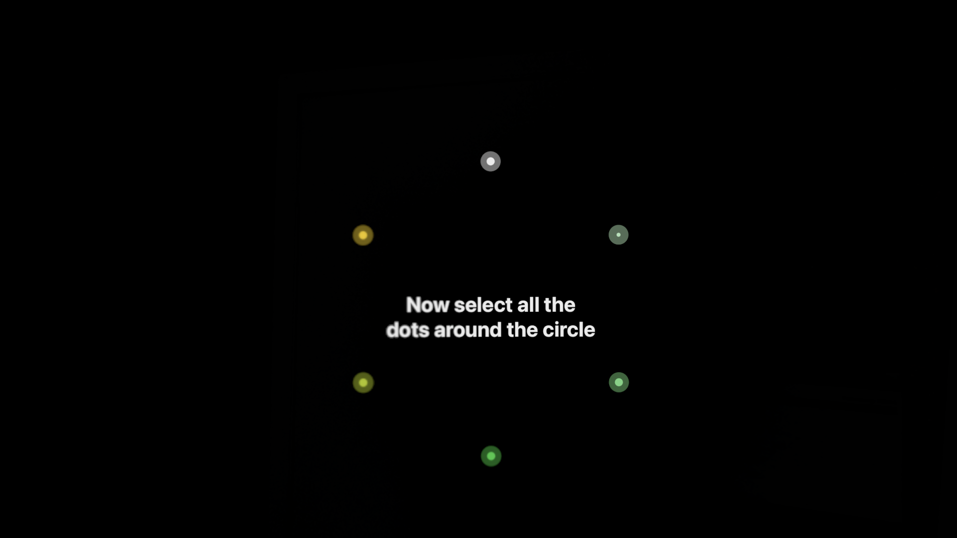 A screenshot of eye setup on visionOS. Six dots are arranged in a hexagon pattern around text reading "Now select all the dots around the circle". The background is a very dimmed view of passthrough to the real world.
