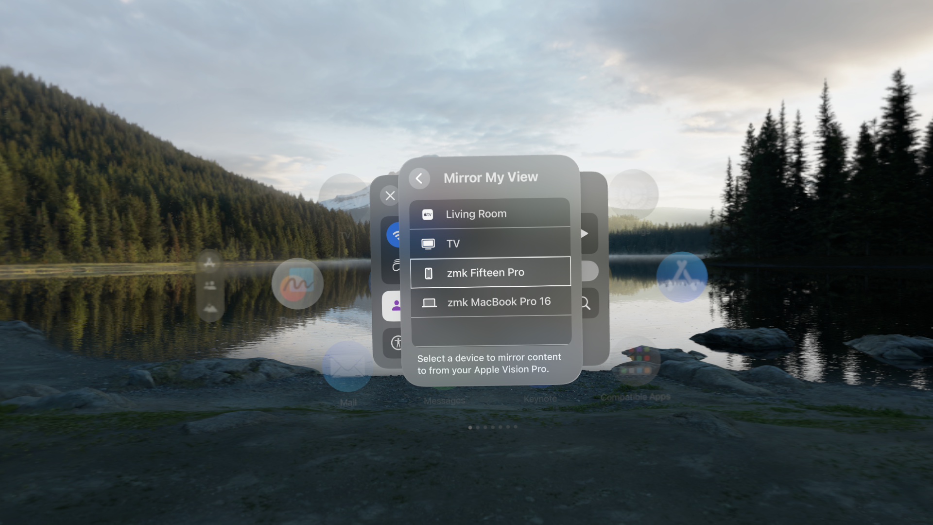 A screenshot of the View Mirroring menu within Control Center on visionOS. A window with "Mirror My View" heading has a list of options including an Apple TV named "Living Room", a TV, an iPhone named "zmk Fifteen Pro", and a Mac named "zmk MacBook Pro 16". Text at the bottom of the window reads "Select a device to mirror content to from your Apple Vision Pro".